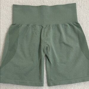 NVGTN Booty contour seamless workout biker shorts. Light green color.